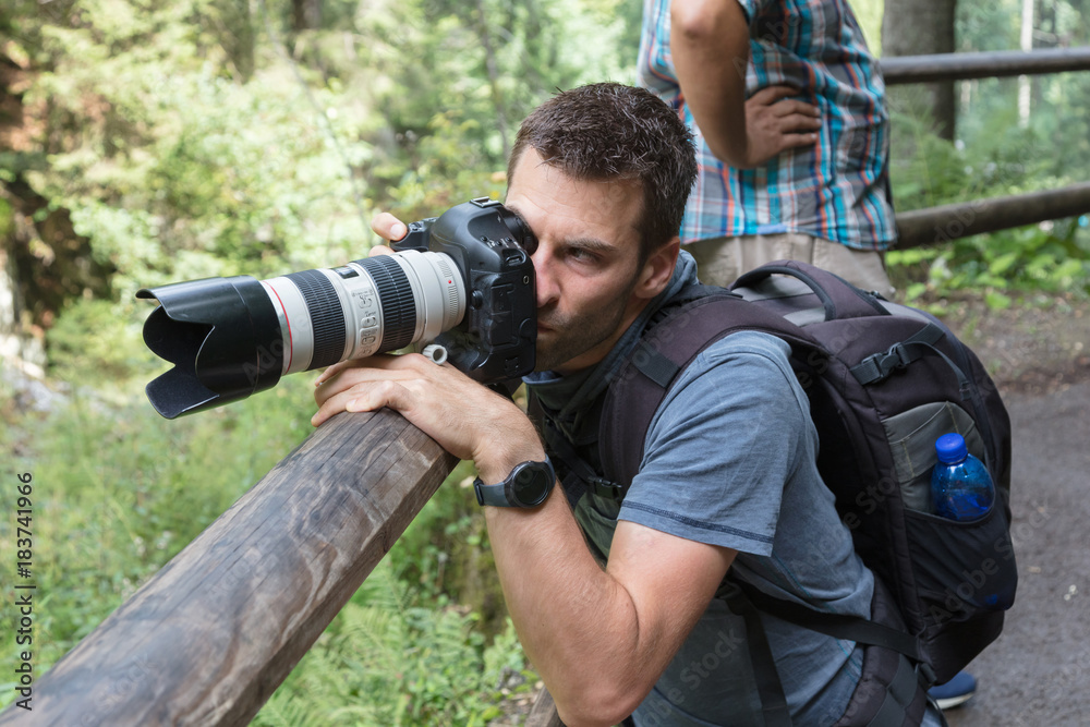 Close up of a male photographer