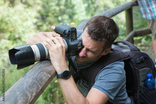 Close up of a male photographer