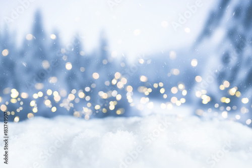 Canvas-taulu snowy winter christmas bokeh background with circular lights and trees