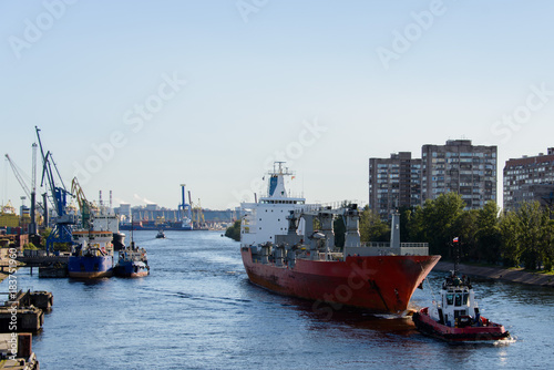 Towing of cargo vessel in port
