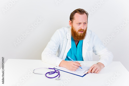 Male doctor at his office