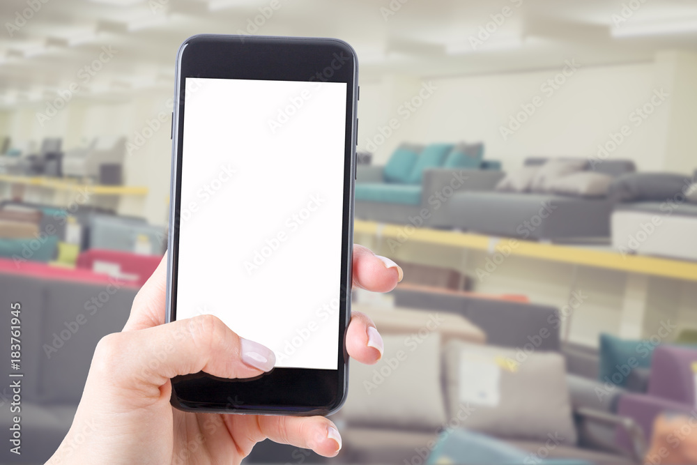smartphone with a blank screen keeps the woman and shopping in the store smartphone with a blank screen keeps the woman and shopping in the store
