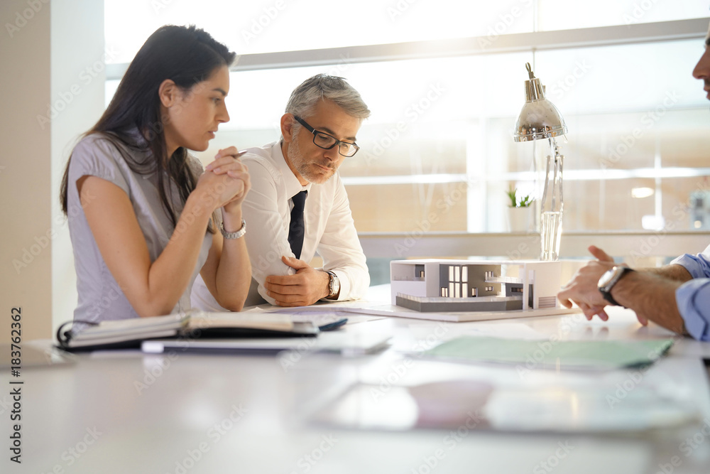 Team of architects working together on construction project