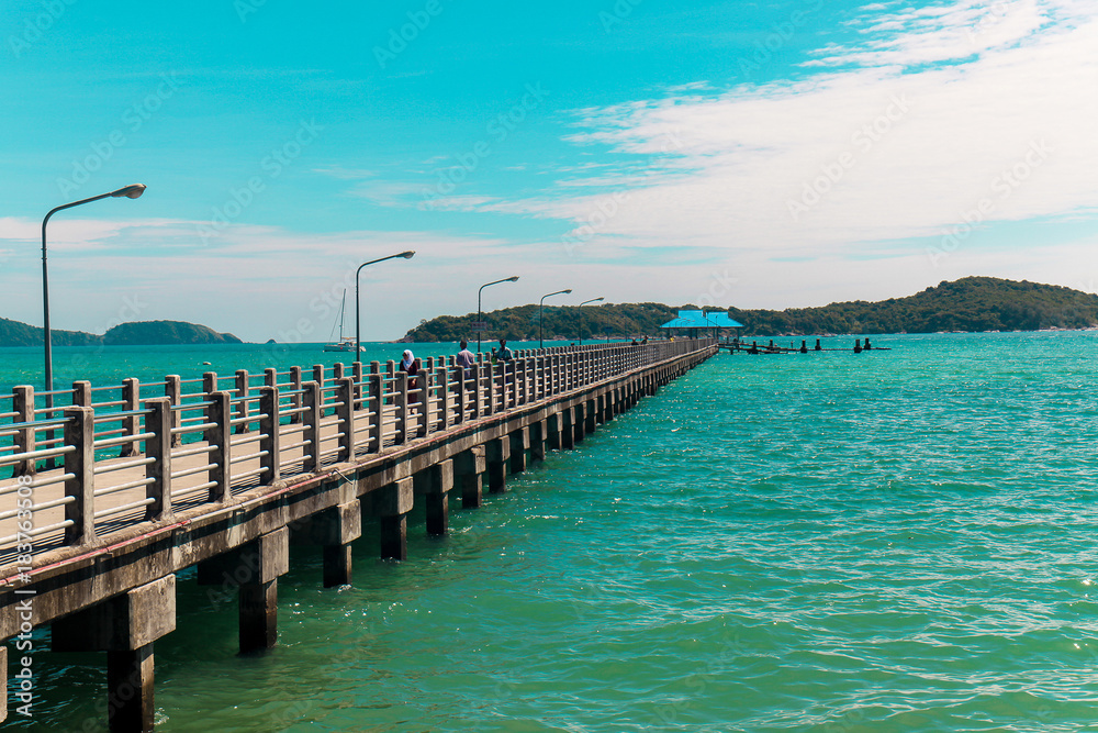 Bridge to the public pier with clear sky day on summer in Phuket Thailand