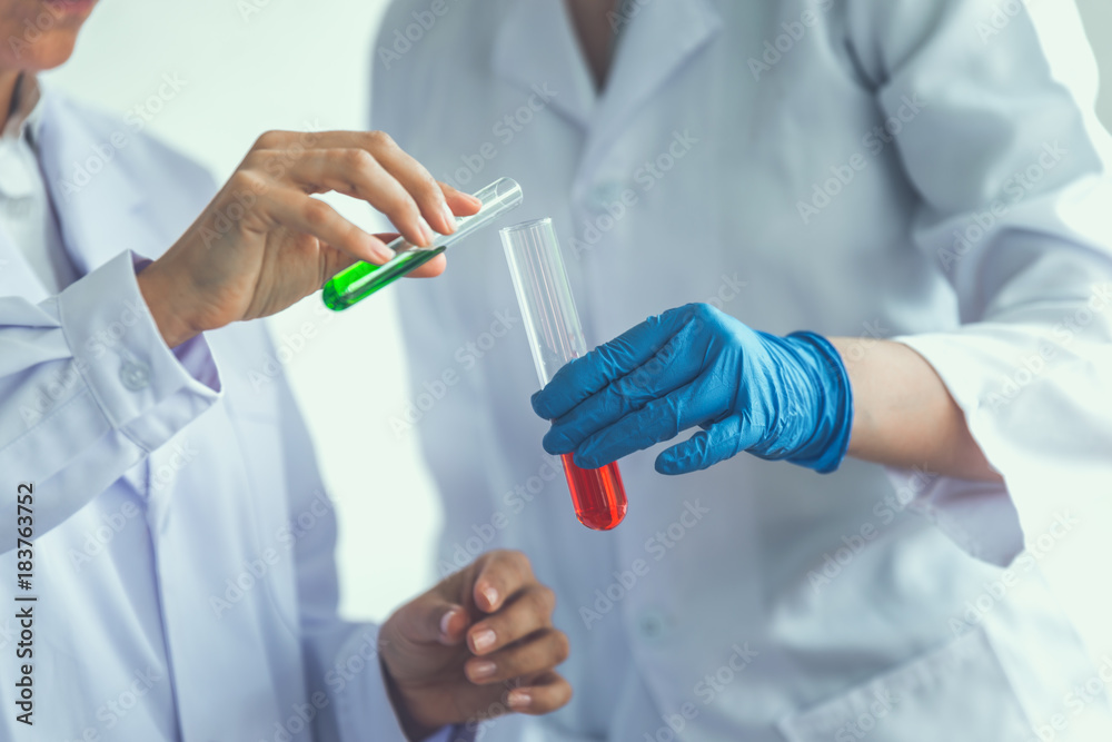 The medicals or scientific laboratory researcher performs tests with liquid in lab The medicals or scientific laboratory researcher performs tests with liquid in lab