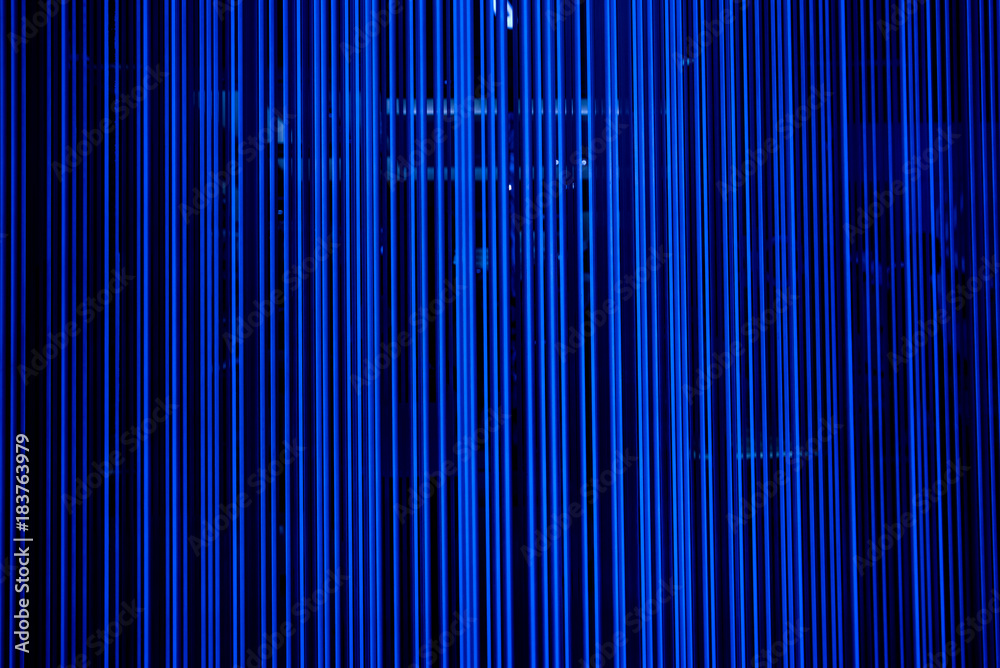 Blue abstract background with magic neon light lines. Blue abstract background with magic neon light lines.