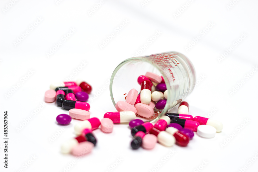 the pile of pills and capsules with isolated white background copy space the pile of pills and capsules with isolated white background copy space