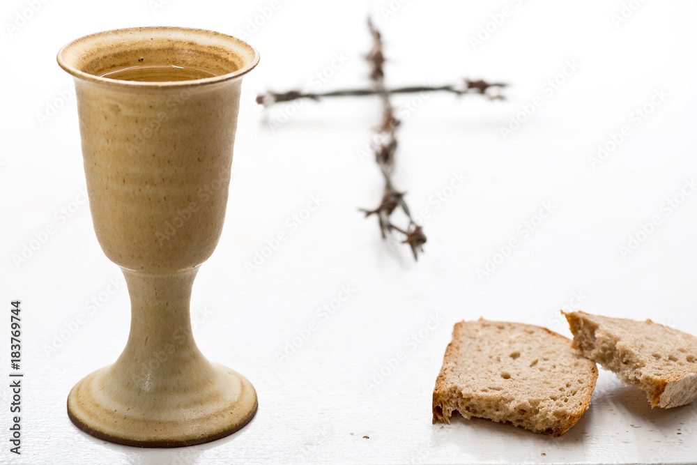 Chalice Of Wine With Bread On The Table