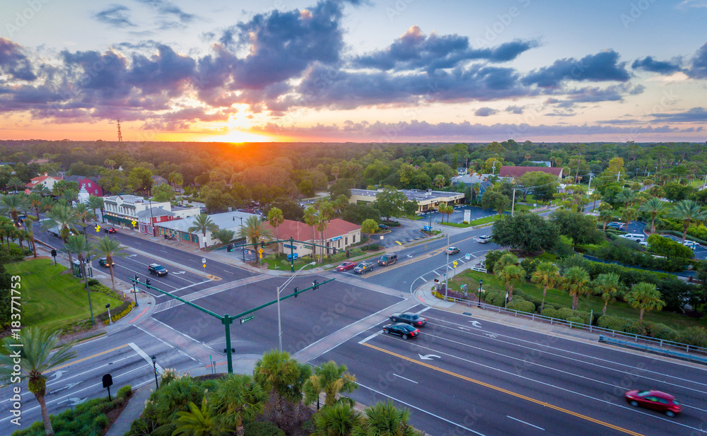 An overhead view of an intersection at sunset