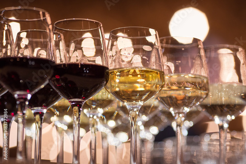 Wine glasses inwarm light  loft restaurant
