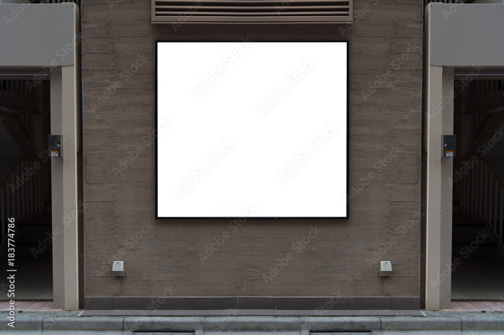 Large blank billboard on a street wall, banners with room to add your own text
