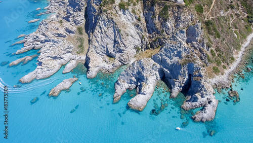 Overhead aerial view of beautiful rock over the ocean photo