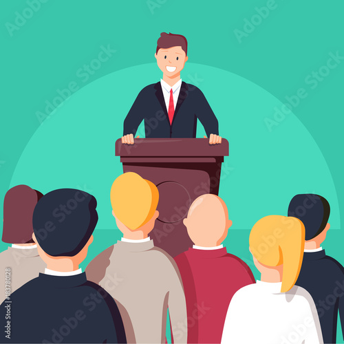 Business conference, business meeting. Man at rostrum in front of audience. Public speaker