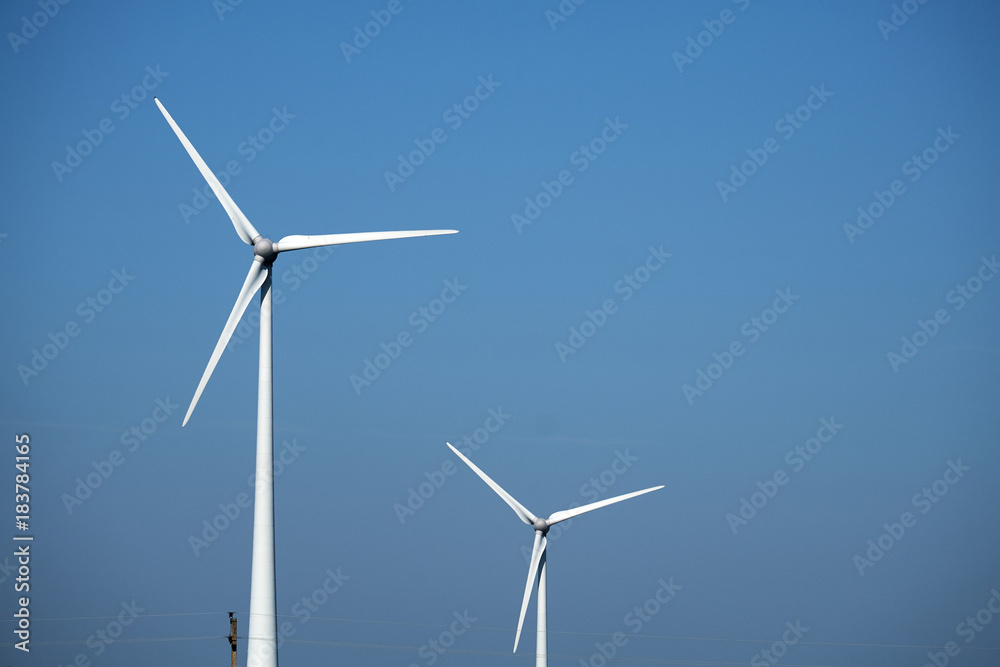 wind mill turbines with blue sky landscape