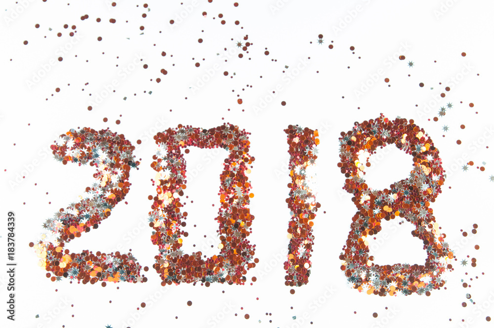 2018 on a white background with confetti 2018 on a white background with confetti