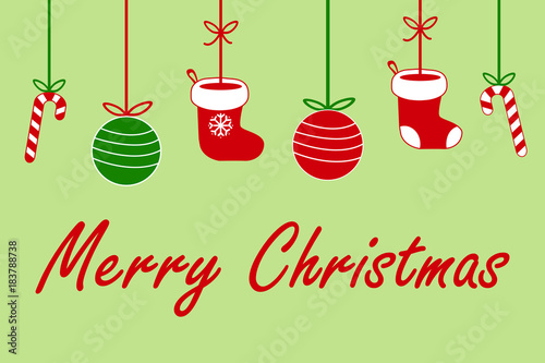 merry christmas sign text with santa claus socks, christmas ball and lolipop candy hanging on ribbon in red white and green on light golden background cute vector greeting card