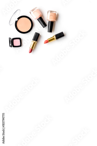 Decorative cosmetics concept. Eyeshadows, rouge on white background top view copyspace