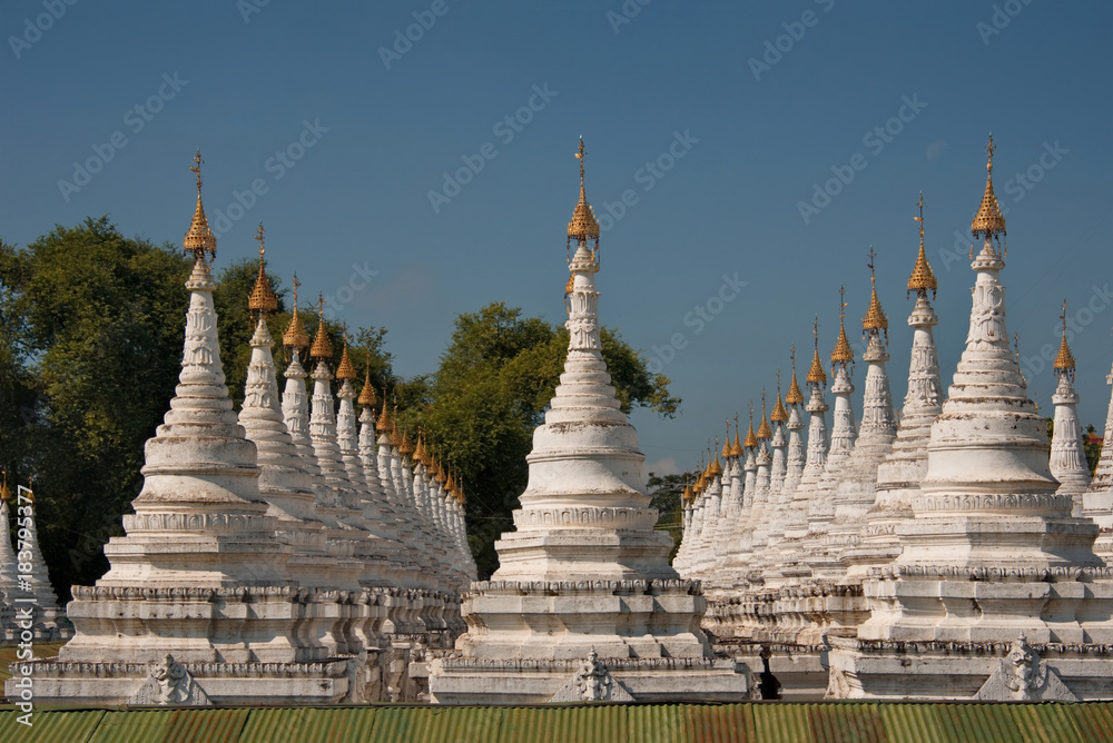 Fototapeta premium Mandalay. Myanmar. 20 November 2016. The Sandar Mu Ni pagoda - the world biggest book. In each of the 758 stupas carved in stone one page of the Holy Book.