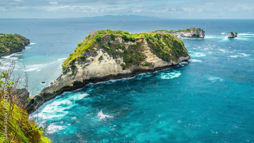 Timelapse Rocks in the Atuh Beach at Nusa Penida Island, Bali, Indonesia Timelapse Rocks in the Atuh Beach at Nusa Penida Island, Bali, Indonesia