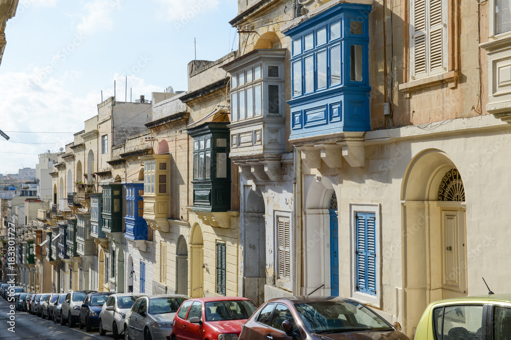 The traditional Maltese colorful wooden balconies in Sliema on Malta