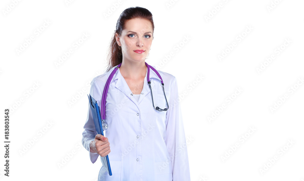 Smiling female doctor in uniform standing at hospital Smiling female doctor in uniform standing at hospital