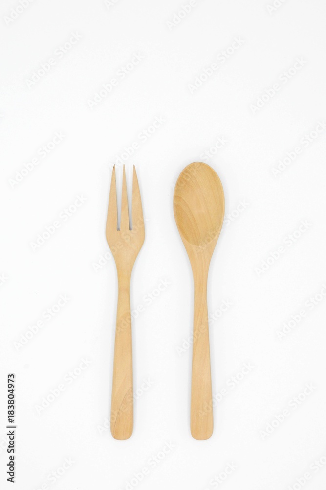 Wooden spoon and fork isolated on white background