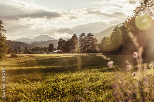 Landscape view of valley fields and mountains, Mozirje, Brezovica, Slovenia photo