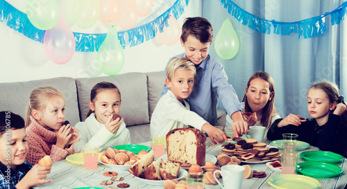 Children having birthday dinner