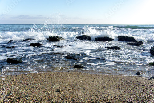 Fototapeta Naklejka Na Ścianę i Meble -   sea ​​waves of stones