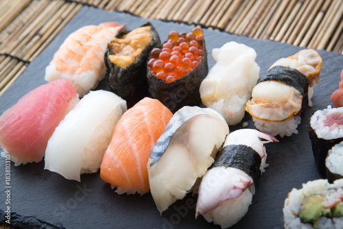 sushi on stone board