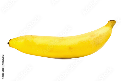 Single yellow banana isolated on white background