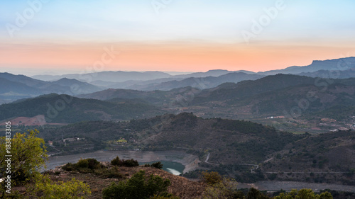 View of the mountain landscape at sunset in Siurana de Prades, Tarragona, Spain. Copy space for text. © ggfoto