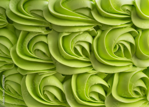 Green cake frosting mix background.
