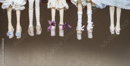 Doll shoes on the feet of the dolls photo