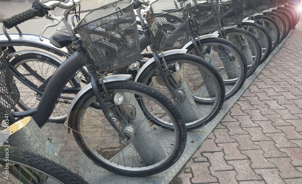 Obraz premium rental bicycle service on the street