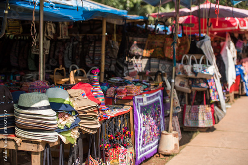 Souvenir shop in the local market in Luang Prabang, Laos. Copy space for text. © ggfoto