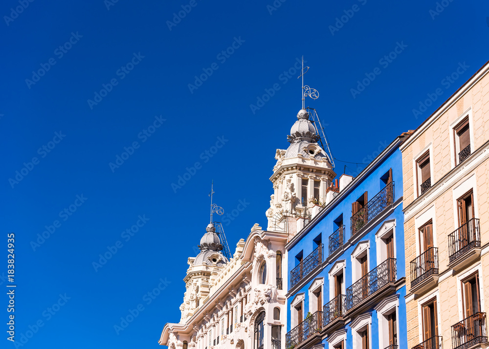 View of city buildings against the blue sky, Madrid, Spain. Copy space for text.