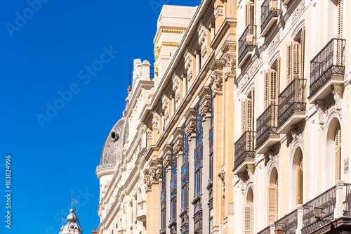View of city buildings against the blue sky, Madrid, Spain. Close-up. © ggfoto