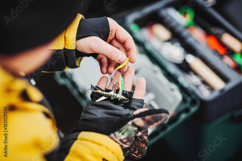 close up ice fishing tackles and equipment.