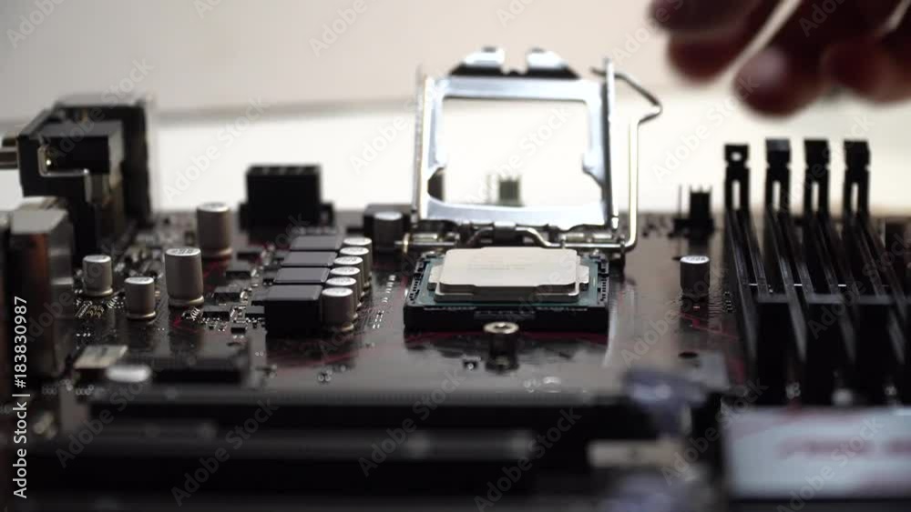 Extraction of the central processor from a motherboard socket. Extraction of the central processor from a motherboard socket.