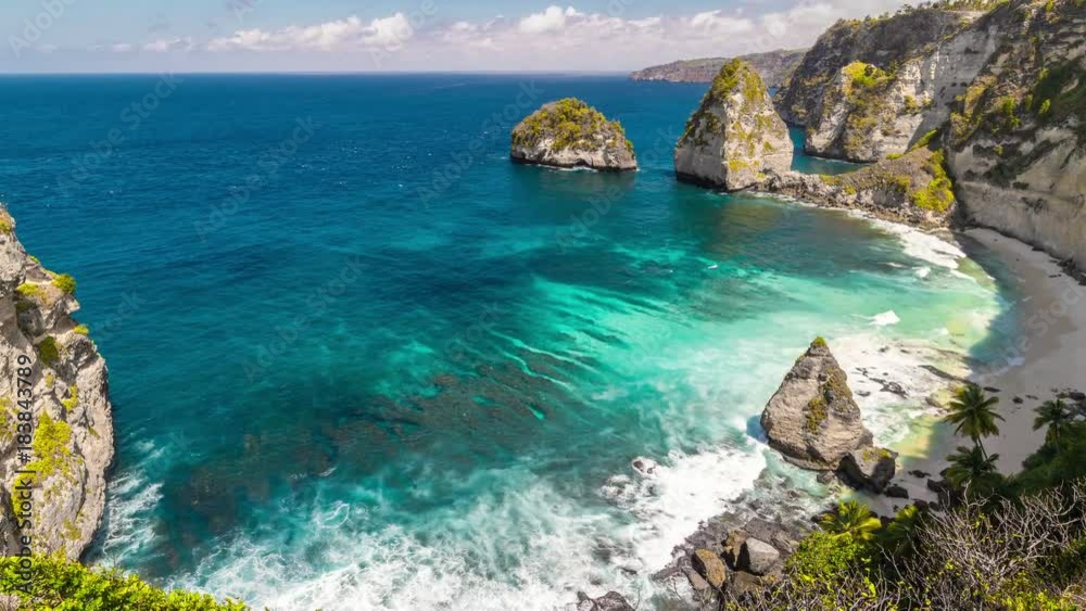 Timelapse View from the cliff to white Atuh Beach at Nusa Penida island, Bali, Indonesia Timelapse View from the cliff to white Atuh Beach at Nusa Penida island, Bali, Indonesia