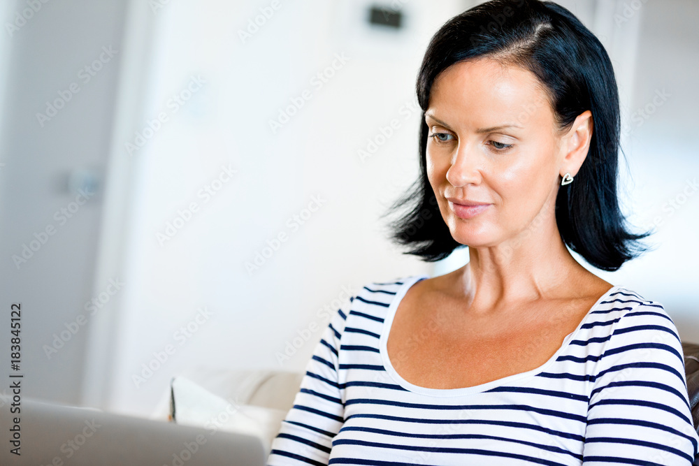 Beautiful woman working on her laptop