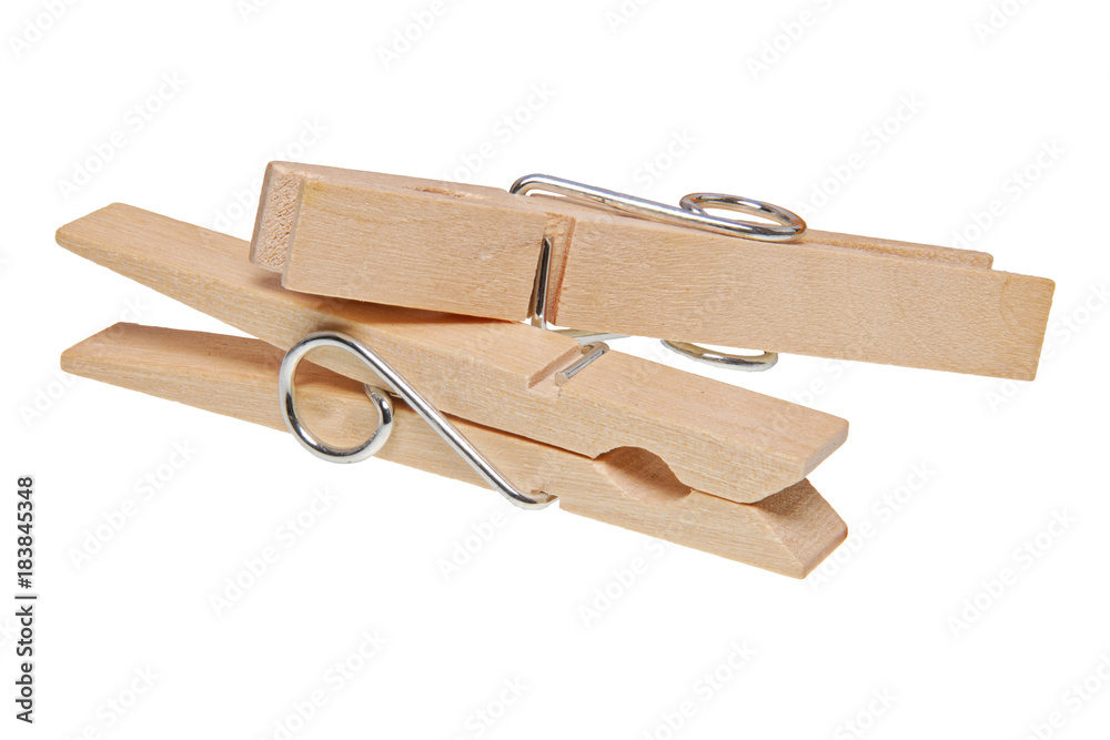 Wooden clothes pegs on a white background Wooden clothes pegs on a white background