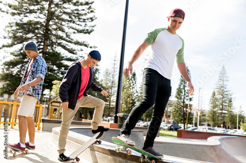 Teenage boys skateboarding outdoors