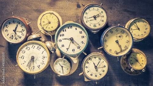 Various clocks looped as time flow concept animation, 4K