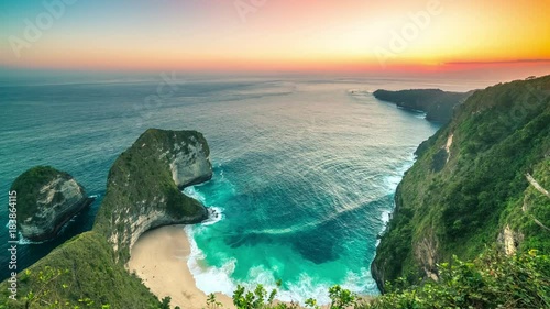 Kelingking beach giant rock sunset timelapse in Nusa Penida, Indonesia photo