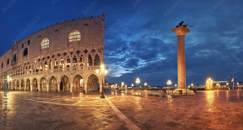 Panoramia of Doge's Palace and St. Marco's square at night in Venice