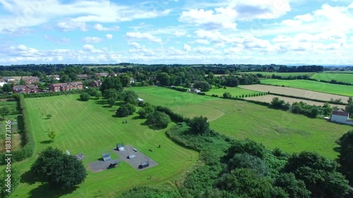 An aerial drone shot of park as the drone slowly gets down to th surface. photo