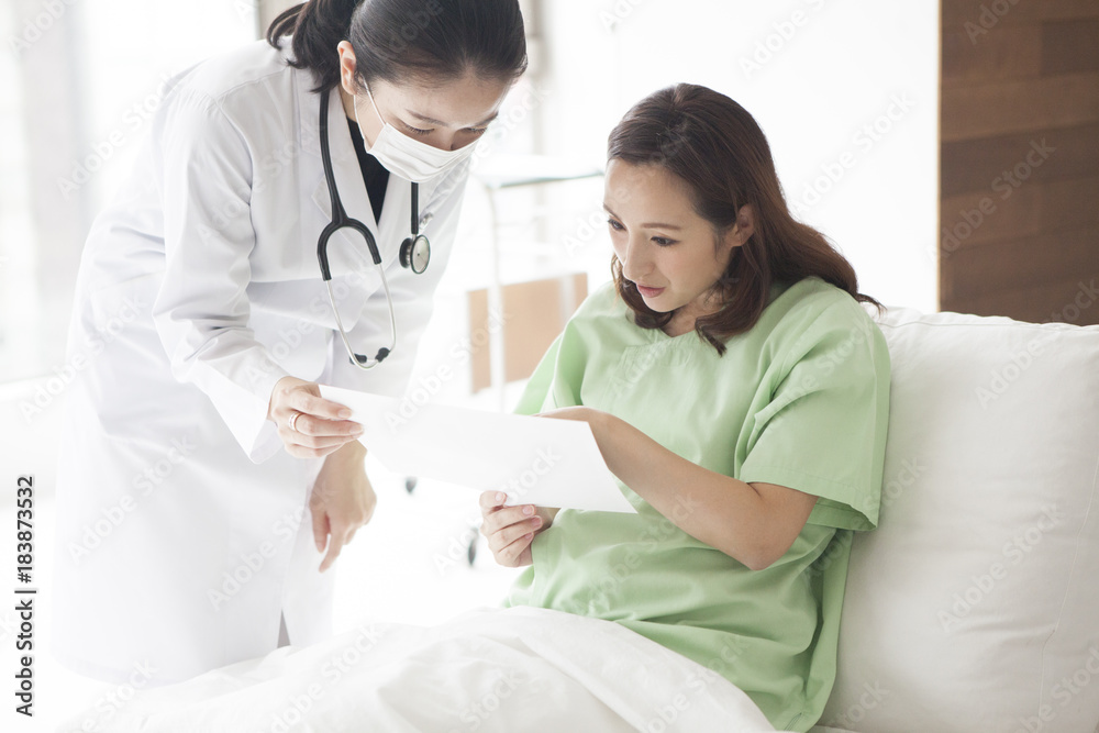 A mother confirming echo of my fetus with a doctor