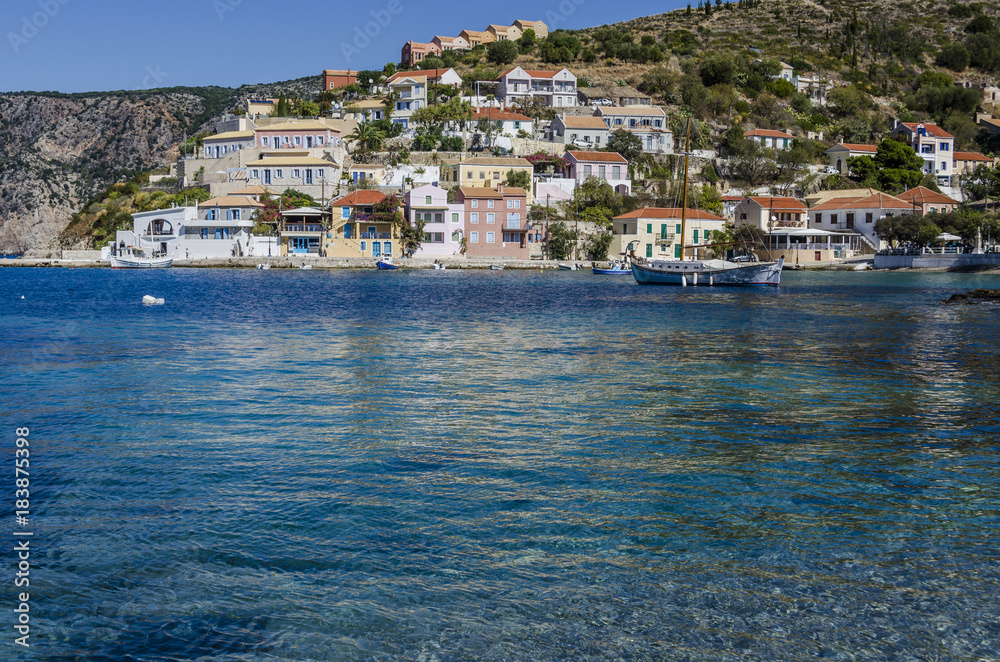 port of assos and their dwellings on the slope of the mountain